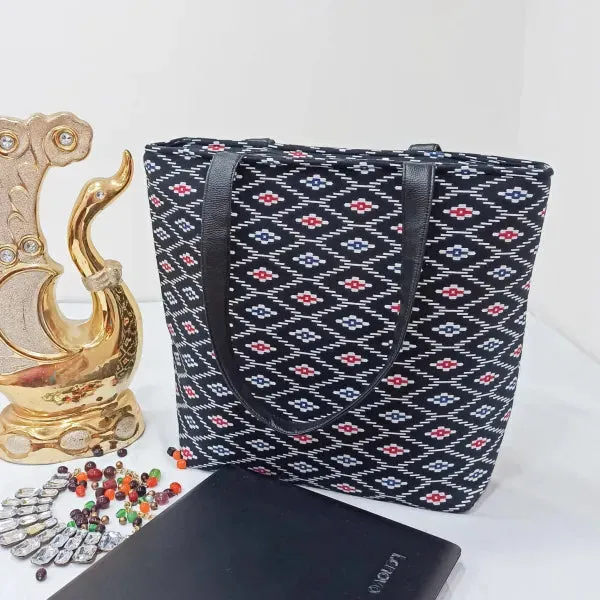 Sarus Crane Lifestyle Tote with Laptop Black with Red Diamond Design.